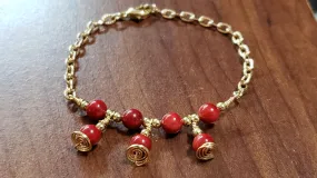 Red Coral Rounds with Gold Tone Chain & Wire Bracelet. Adjustable to 7" with Lobster Claw Clasp
